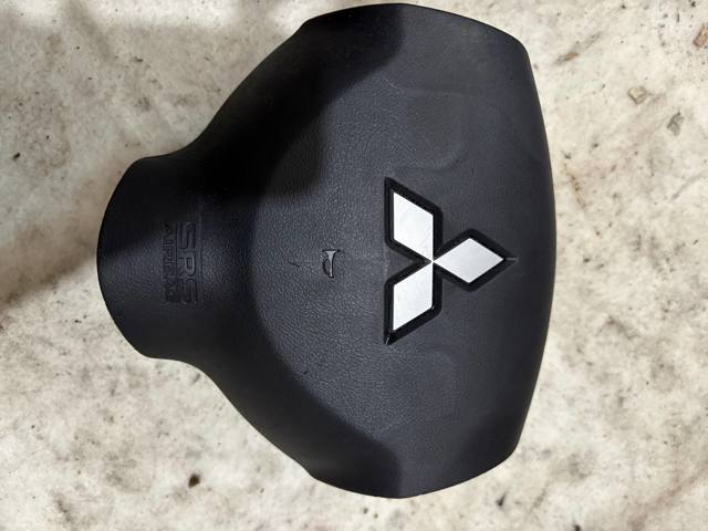 Подушка в кермі 7030A088XA MITSUBISHI