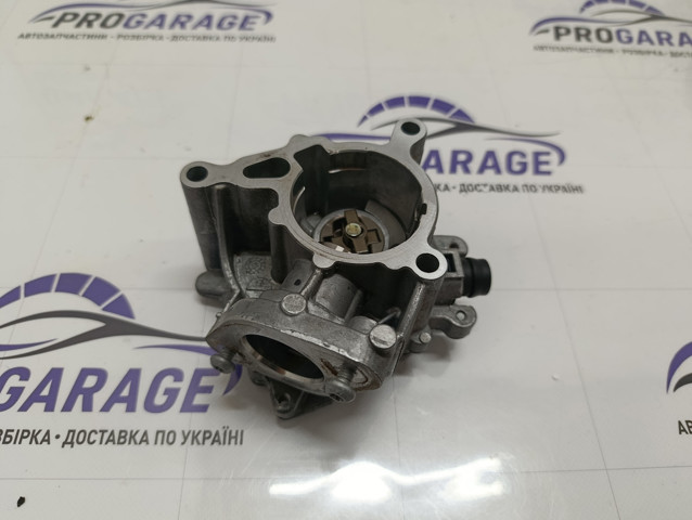 Насос вакуумний 06K145100BB VAG