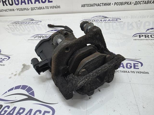 Супорт гальмівний задній правий 34216793042 BMW