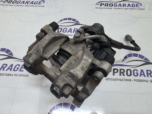 Задній гальмівний супорт лівий 3Q0615423 VAG