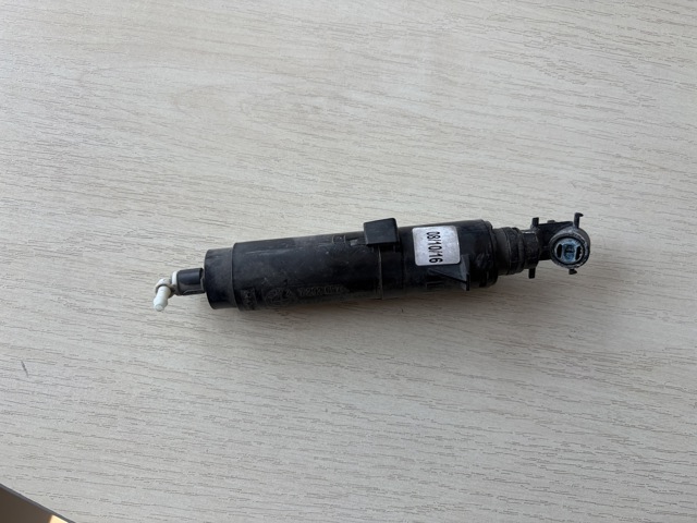Форсунка омивача фари передньої, лівою 61677292657 BMW