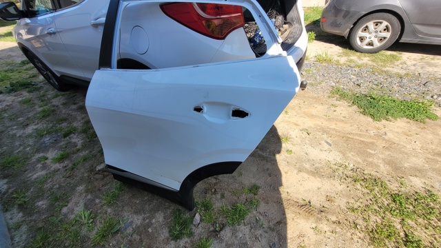 Двері пасажирськи задні ліві 77003S1010 HYUNDAI