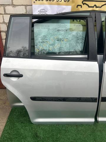 Двері пасажирські задні праві 1T0833056R VAG