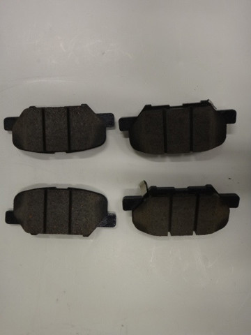 Комплект задніх колодок B4Y02648ZC MAZDA