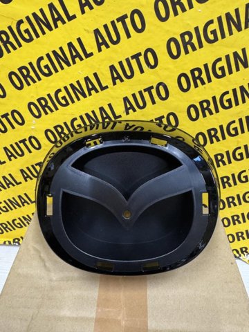 Кронштейн емблеми решітки радіатора GBFN50716 MAZDA