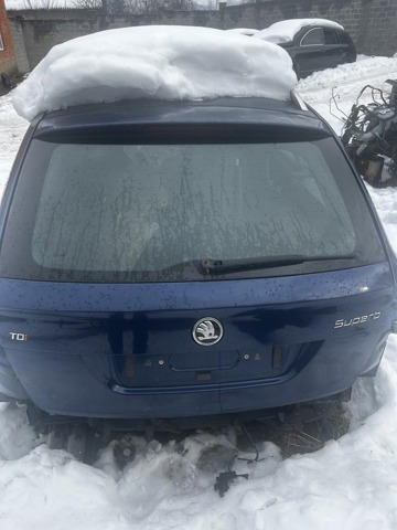 Треті двері Skoda SuperB II