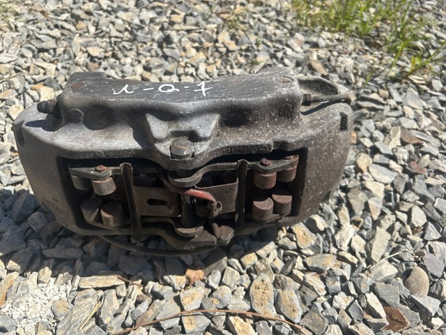 Супорт гальмівний, передній, лівий 7L6615149 VAG