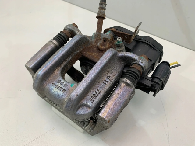 Супорт гальмівний задній правий 6793042 BMW