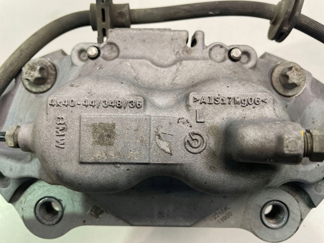 Супорт гальмівний, передній, лівий 6891275 BMW