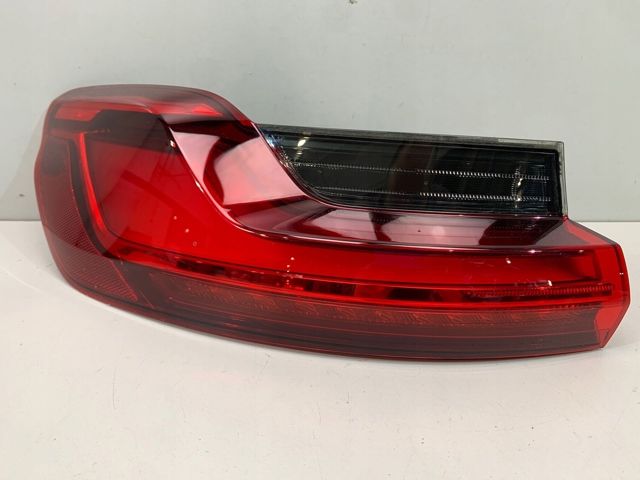 Задня ліва зовнішня фара 7409395 BMW