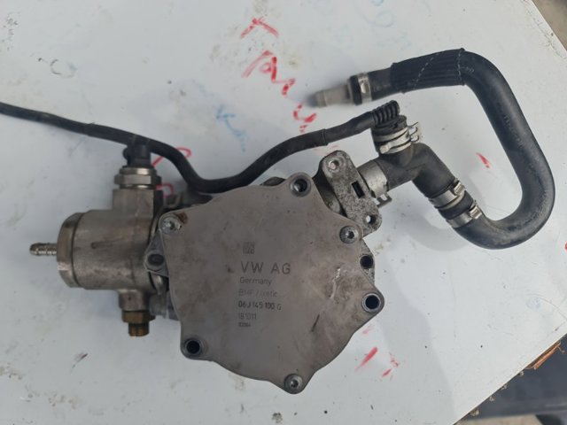 Насос вакуумний 06J145100G VAG