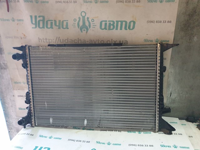 Радіатор водяний 8MK376753491 HELLA