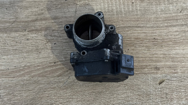 Блок дросельної заслінки 03L128063Q VAG