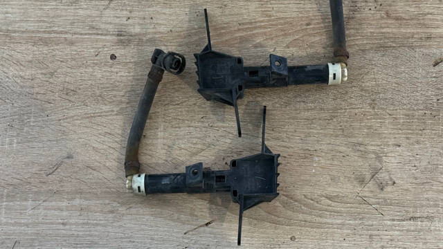 Форсунка омивача фари передньої, правої 86636SC000 SUBARU
