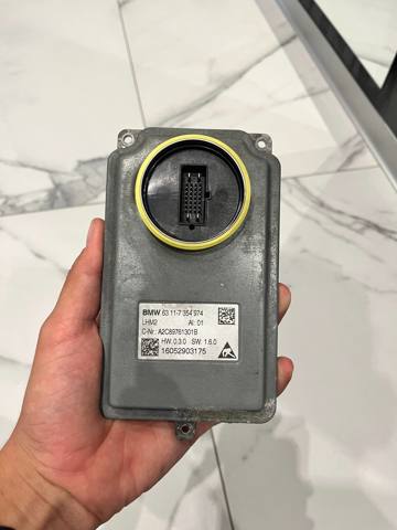 Блок керування освітленням 7354974 BMW