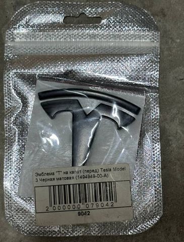 Емблема капота 149494900A TESLA
