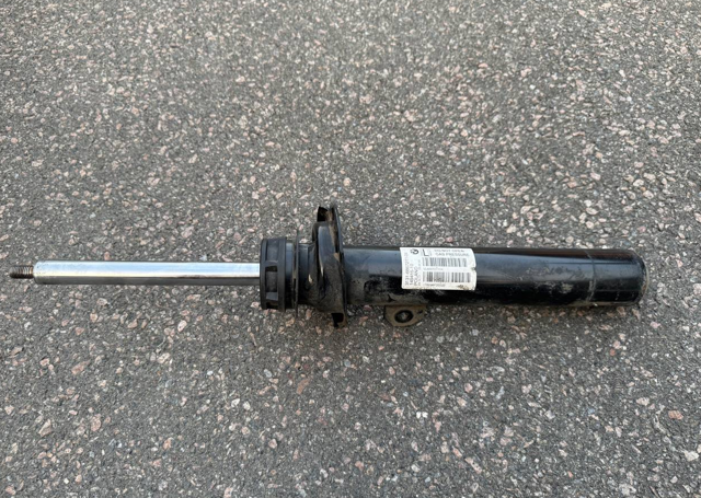 Ліва передня стійка 31316867211 BMW