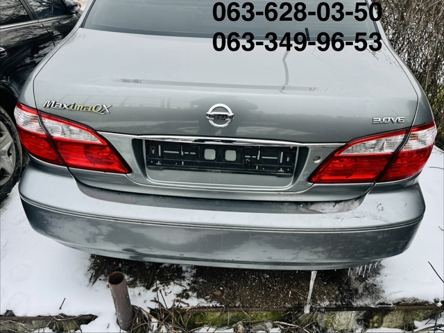 Бампер задній 850223Y125 NISSAN