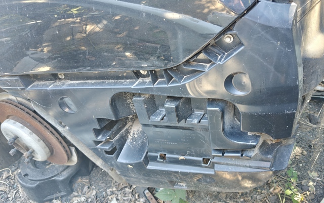 Лівий кронштейн кріплення бампера заднього 51127184767 BMW