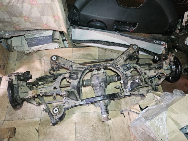 Цапфа - поворотний кулак задній, лівий 28411AL07A SUBARU