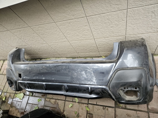 Кут бампера заднього правий 57704FL250 SUBARU
