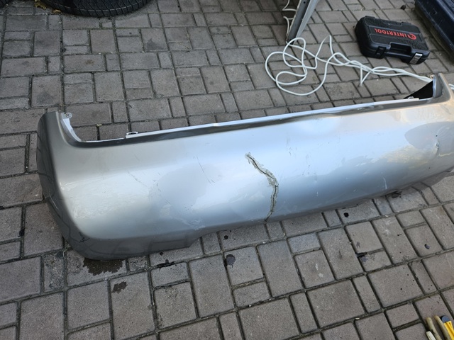 Кожух бампера заднього 85022AX640 NISSAN