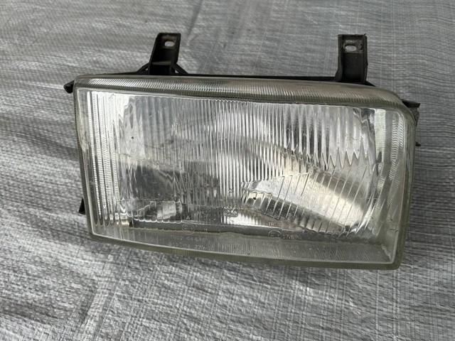 Фара передня права 7R0144438 VAG