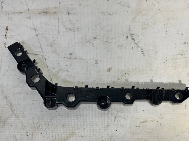Кронштейн бампера заднього, правий 852209HS0A NISSAN