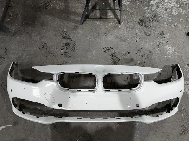 Кожух бампера переднього 51117427120 BMW
