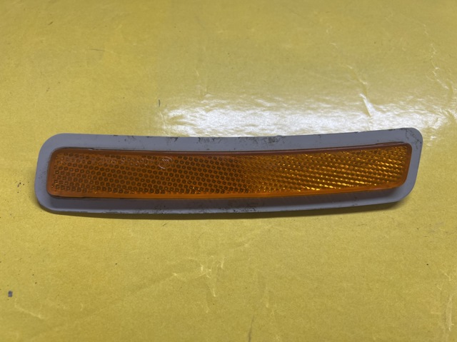Катафот (відбивач) переднього бампера, правий 7411974 BMW
