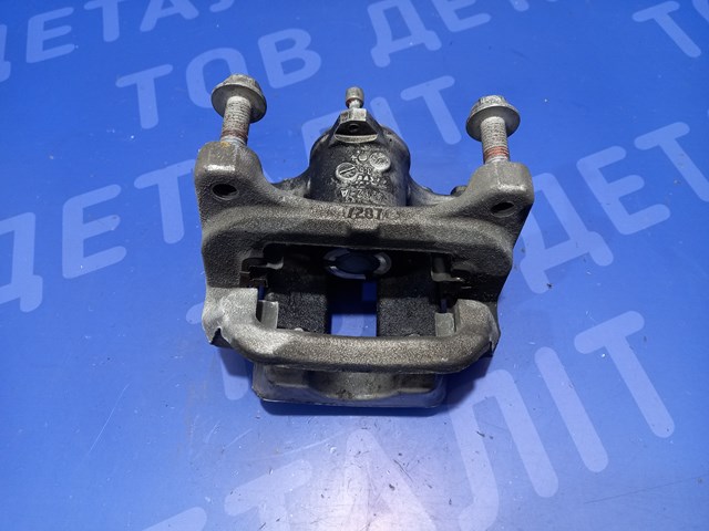 Супорт гальмівний задній правий 13515118 GM