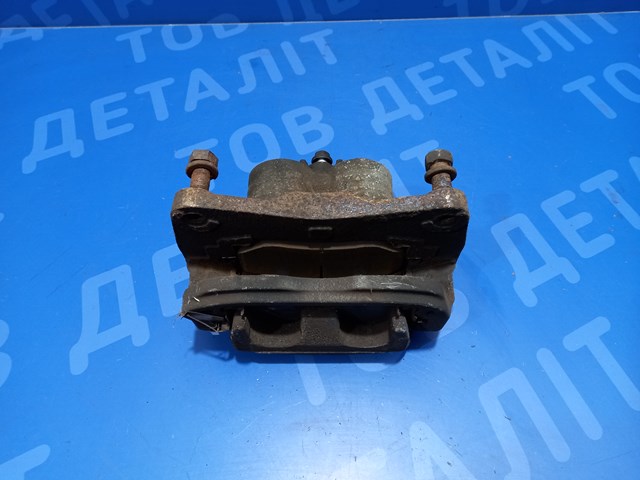 Супорт гальмівний, передній, лівий 26292SC031 SUBARU