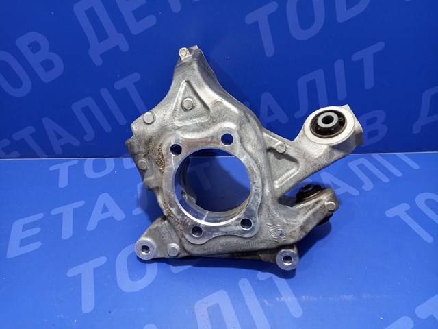 Кулак поворотний правий 28411AN02A SUBARU