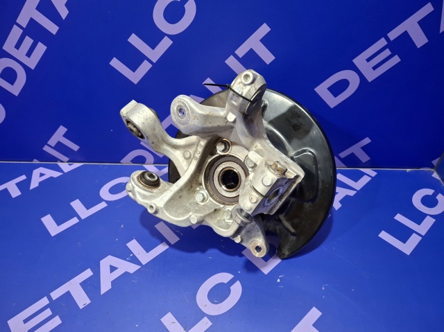 Кулак поворотний правий 28411FL040 SUBARU