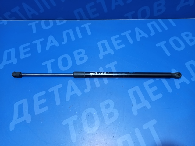 Стійка капота ліва 57251AL00A SUBARU