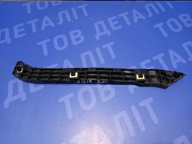 Кронштейн бампера заднього, зовнішній лівий 57707SG090 SUBARU