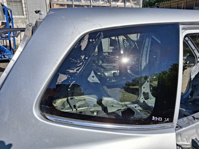 Скло кузова/багажного відсіку, праве 65209SG062 SUBARU