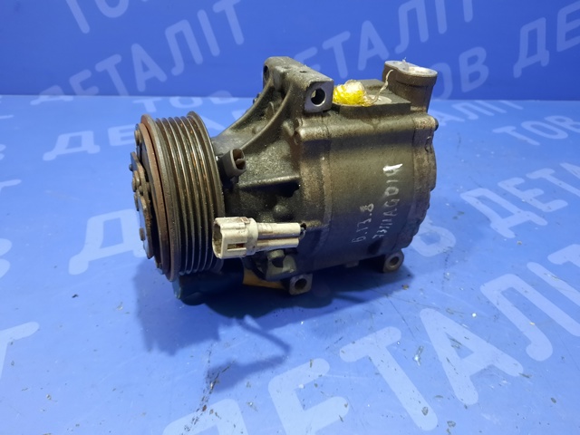 Компресор кондиціонера 73111AG011 SUBARU