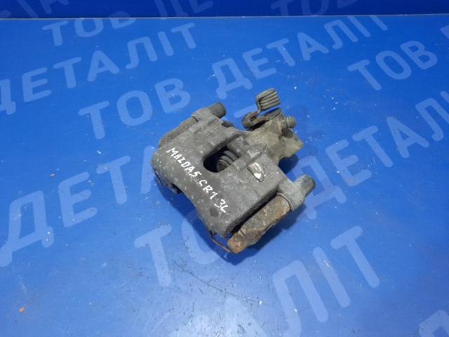 Задній гальмівний супорт лівий CCY92671X MAZDA