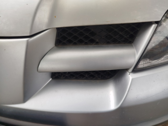 Решітка радіатора ліва MN150679 MITSUBISHI