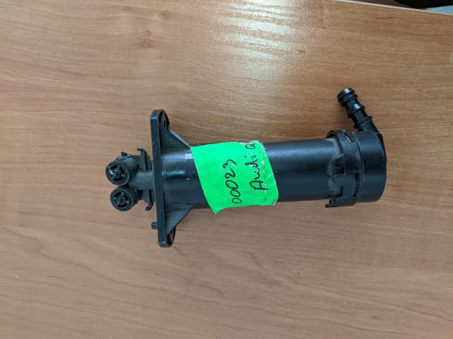 Форсунка омивача фари передньої, лівою 4L0955101 VAG