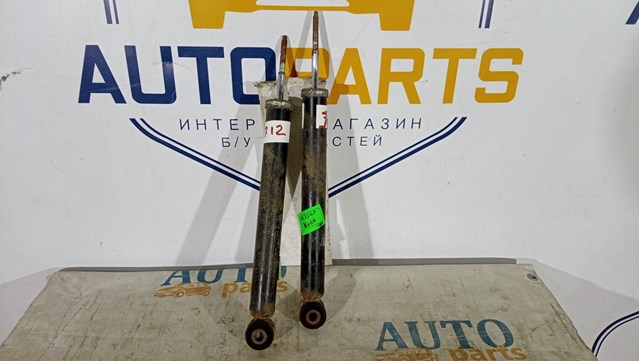 Задній амортизатор 562109U025 NISSAN