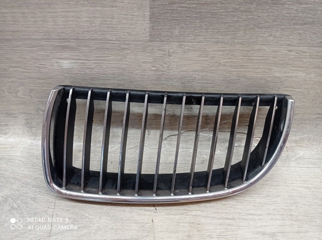 Решітка радіатора ліва 7120009 BMW