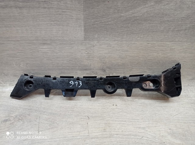 Кронштейн бампера заднього, правий GHP9502H1 MAZDA