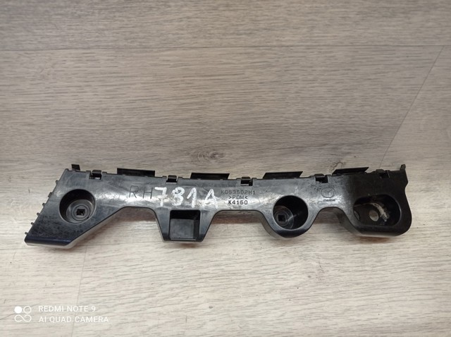 Кронштейн бампера заднього, зовнішній правий KD53502H1 MAZDA