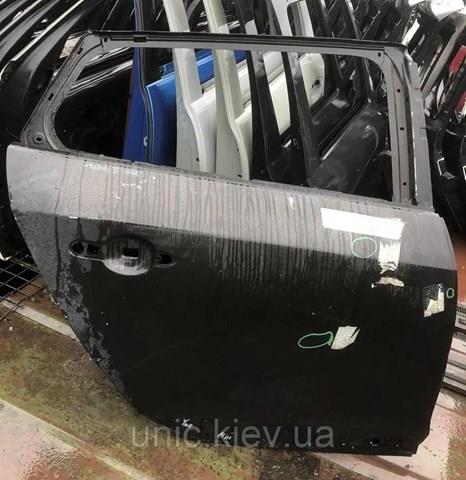 Двері пасажирські задні праві 821007080R RENAULT