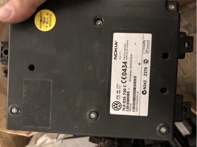 Блок керування мультимедійний 7L6035730C VAG