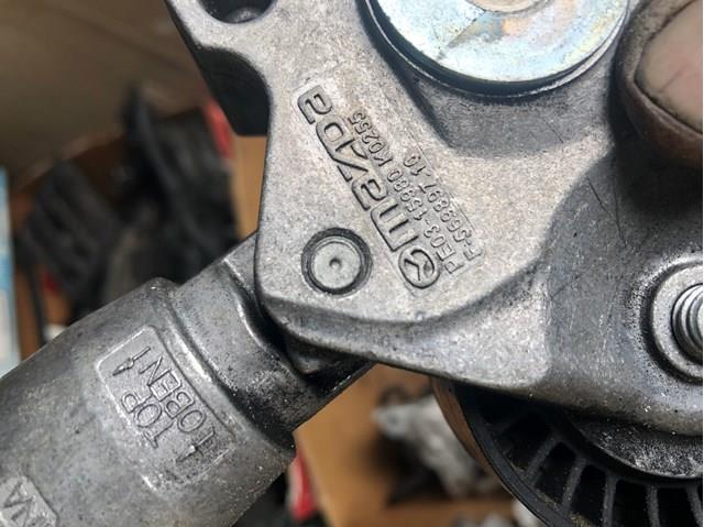 Натягувач приводного ременя PE0315980 MAZDA