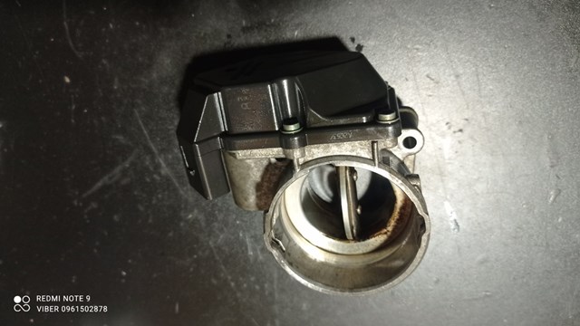Дросільна заслінка в зборі 03G128063G VAG