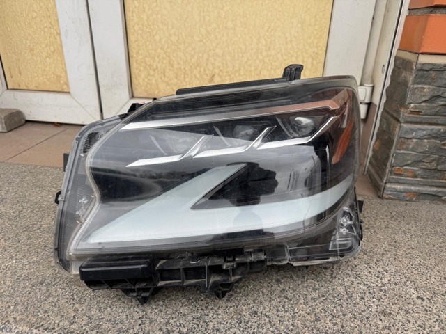 Основна фара в зборі ліва 8118560P70 TOYOTA
